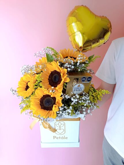 box de girasoles y chocolates